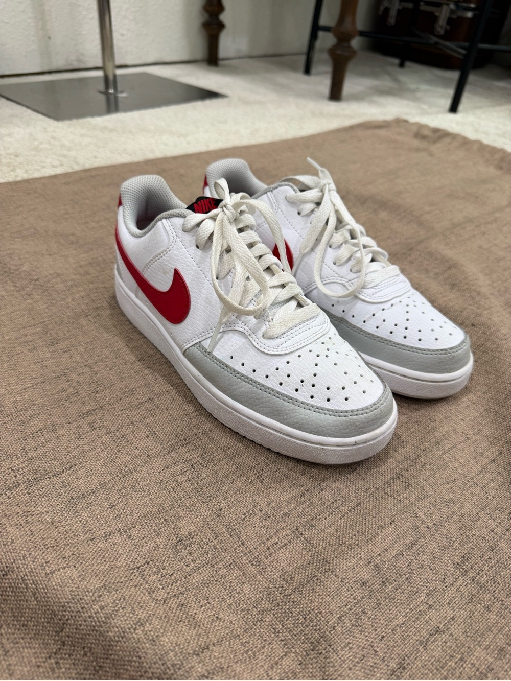 Nike White Leather Low-Top Sneakers with Red Swoosh